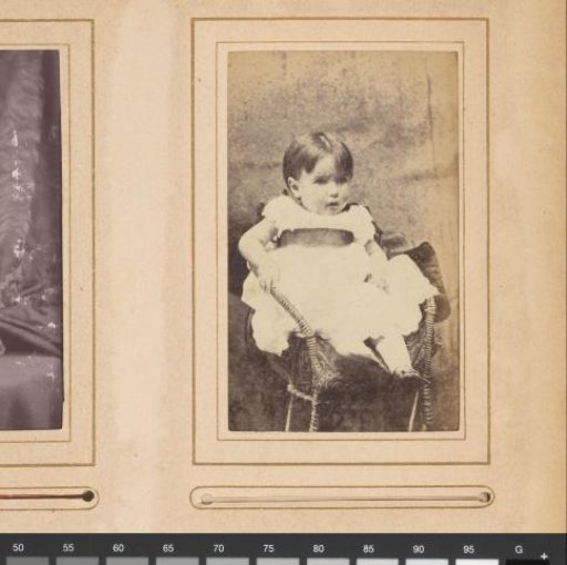 Portrait of a child sitting in a chair