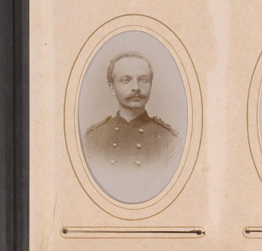 Portrait of a man with a moustache in uniform
