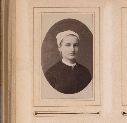 Portrait of a young woman with a cap