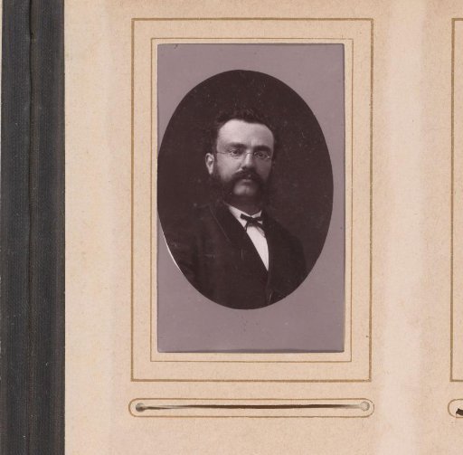 Portrait of a man with spectacles and sideburns
