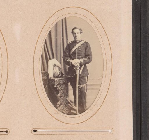 Portrait of a Man in Uniform with Helmet and Sword