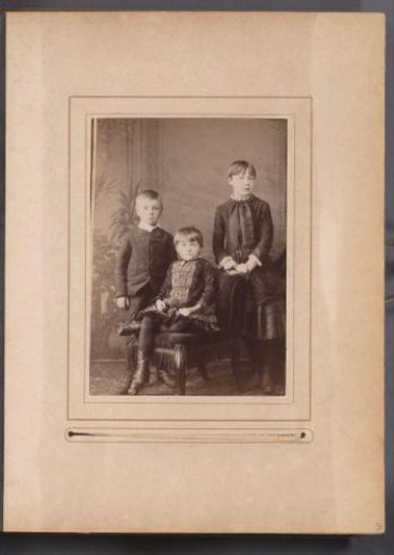 Group portrait with two girls and a boy