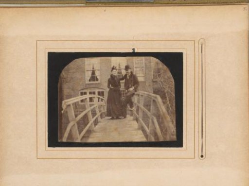 Portrait of a Man and Woman Standing on a Bridge