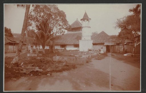 Mosque with minaret in Kebon Djeroek (Batavia), in the foreground graves