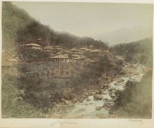 Landscape with a village along a stream in Japan