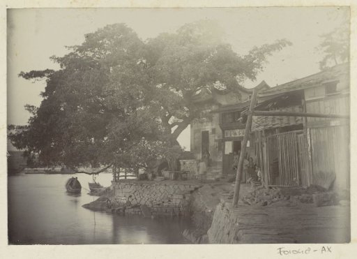 View of a house with a yard along the water, presumably in Fuzhou