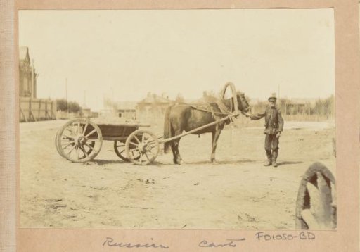 Man with horse and cart in Russia