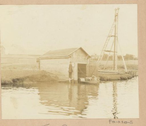 Men at a boathouse in Russia