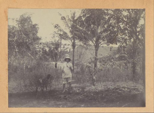 European man standing in a field in the Dutch East Indies