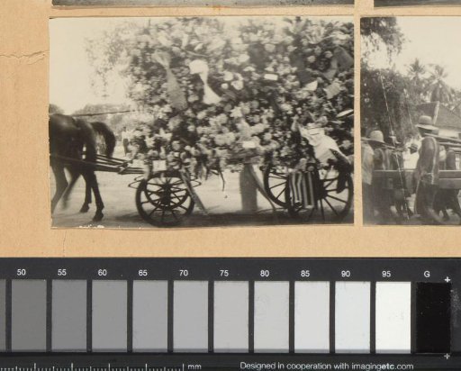 Flower-decorated cart in a funeral procession, probably in Yogyakarta