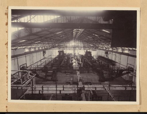 Exterior of a sugar factory, a railway yard and crane in Purworejo
