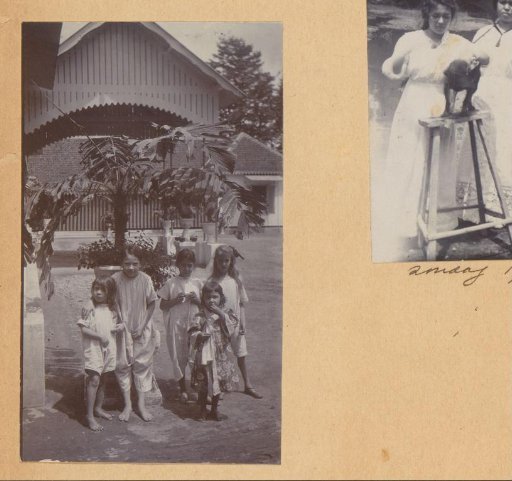 Group portrait of five children in a garden in the Dutch East Indies