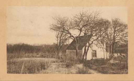 Landscape with a house under bare trees, probably in the Netherlands