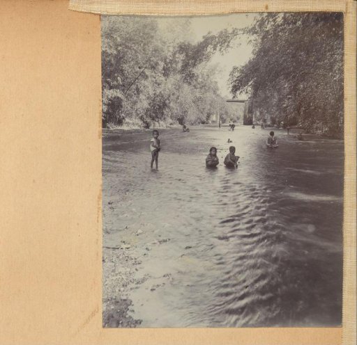 Children playing in a river in the Dutch East Indies