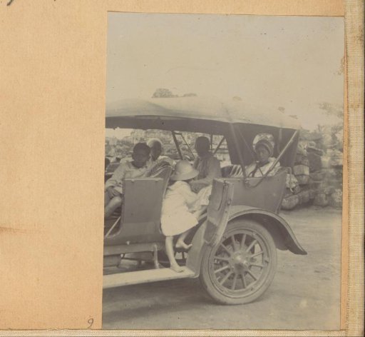 People with children in a car in Prambanan
