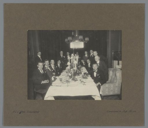 Student company at table during a feast