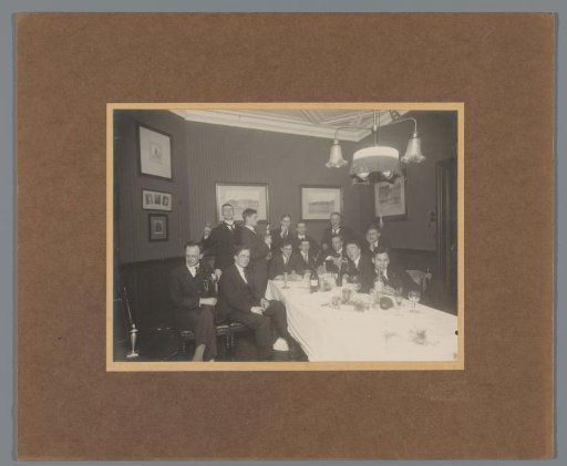 Group portrait of members of rowing club Laga at a farewell dinner