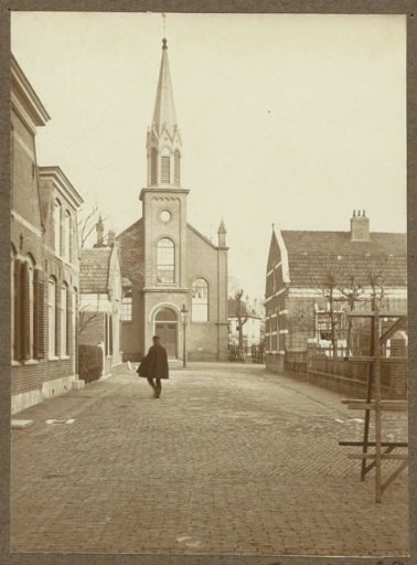 Village street with the Sloterkerk in Sloten (North Holland)