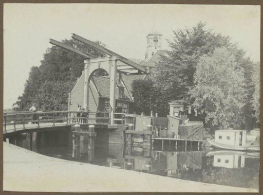 Bridge with the tower of the Amstelkerk in Ouderkerk aan de Amstel in the background