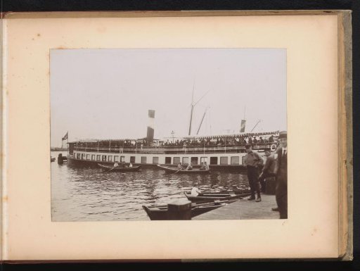 Group of members of the Amsterdam Student Corps on a moored tour boat
