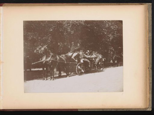 Members of the Amsterdam Student Corps in a carriage