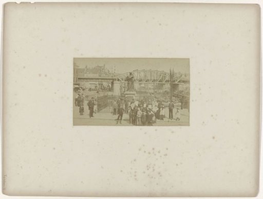 Public at the statue of Erasmus on the Grote Markt in Rotterdam