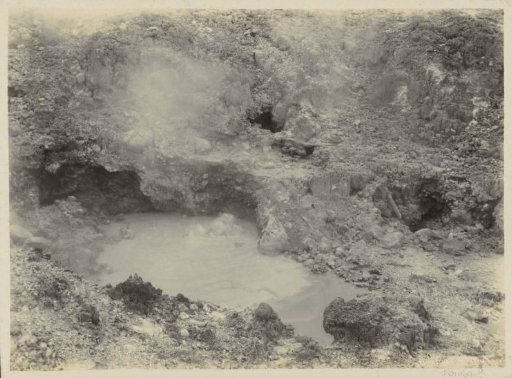 Natural spring amidst stone in the Dutch East Indies