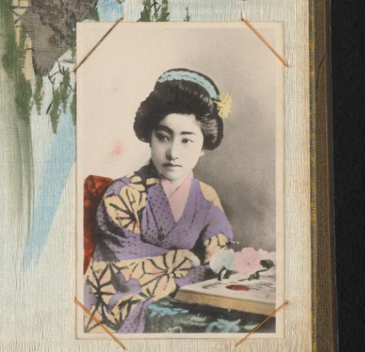 Japanese woman in a purple kimono with a flower in her hair