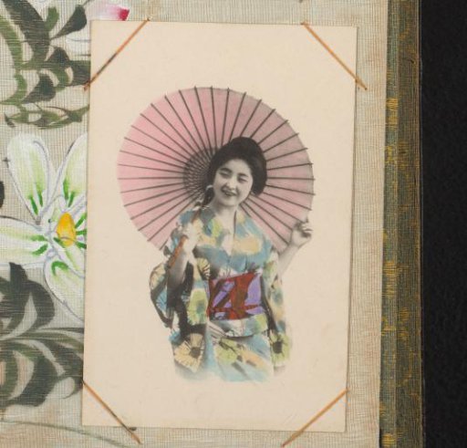 Japanese woman in a colored kimono with an umbrella