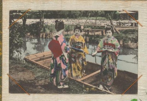 Three women in colored kimonos, one with a closed umbrella, standing in a wooden boat