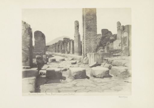 Remains of a street in Pompeii, viewed towards Vesuvius