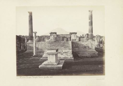Remains of the Temple of Venus in Pompeii with Vesuvius in the background