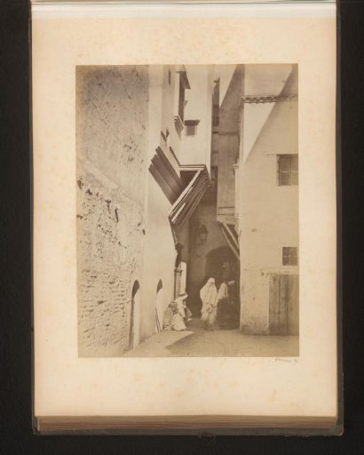 View of a man and woman on the street in the kasba of Algiers