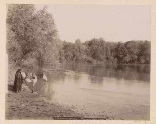 Man with a horse on the shore of the Jordan