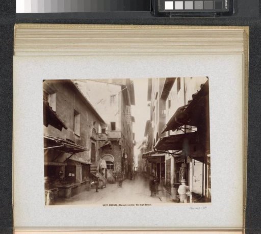 Via degli Strozzi in Florence with shops and passers-by