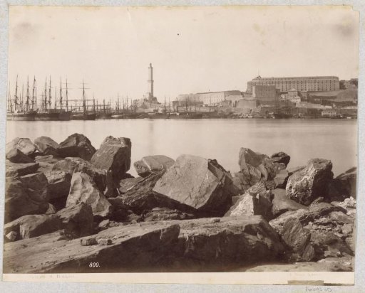 View of the San Benigno district in Genoa with a lighthouse in the middle