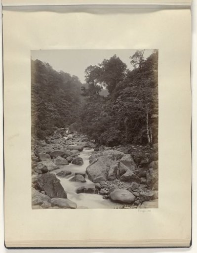 Stream with boulders in the Dutch East Indies