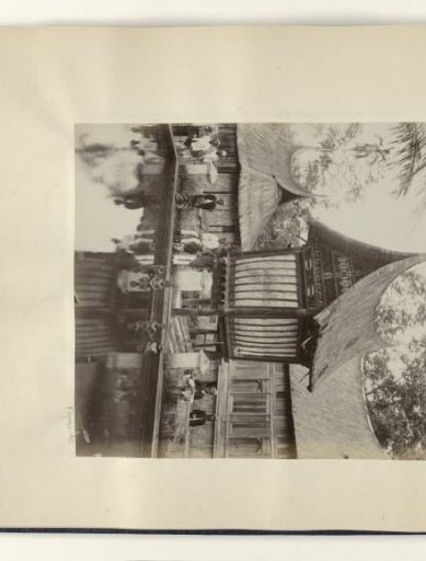 Children and adults at a rice barn in Batipoeh on Sumatra