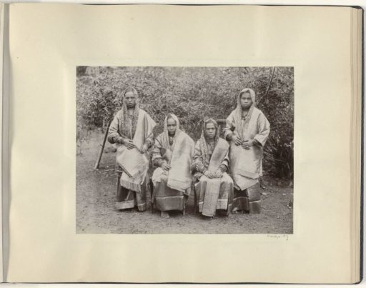 Group portrait of four Minangkabau women in rich dress from the Padang Highlands