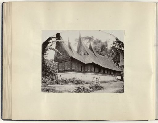 People in front of the Minangkabau house in Sumatra