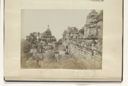 Man on a gallery of the Borobudur on Java
