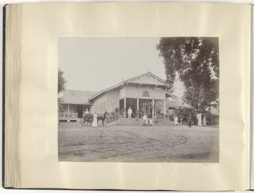 Dutch family and servants posing in front of the residence of the Governor of Aceh and Dependencies in Kota Raja