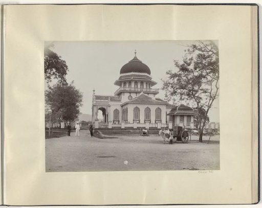 Men with an ox cart in front of the Great Mosque of Banda Aceh