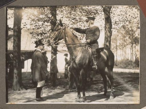 Equestrian scene at the Royal Gamekeeper's Lodge Het Loo: rider and man on a country road
