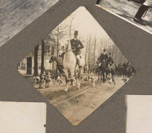 Equestrian scene at the Royal Gamekeeper's Lodge Het Loo: riders with a pack of hounds on a country road