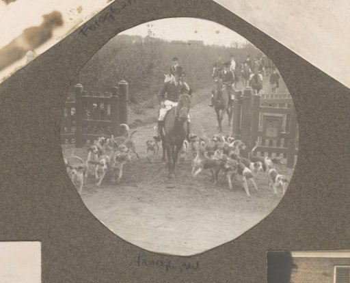 Equestrian scene at the Royal Gamekeeper's Lodge Het Loo: riders with a pack of hounds passing a gate