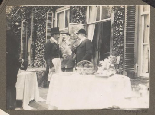 Equestrian scene at the Royal Gamekeeper's Lodge Het Loo: company at set tables at a country house