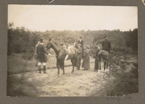 Equestrian scene at the Royal Game Preserve Het Loo: riders with public on a road