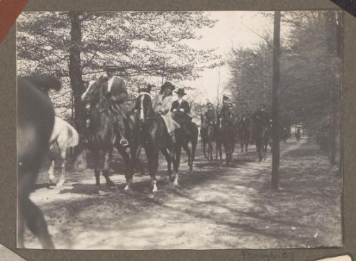 Equestrian scene at the Royal Game Preserve Het Loo: riders on an avenue