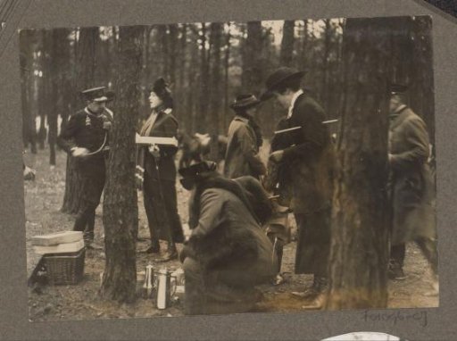 Equestrian scene at the Royal Game Preserve Het Loo: riders eating and drinking in a forest